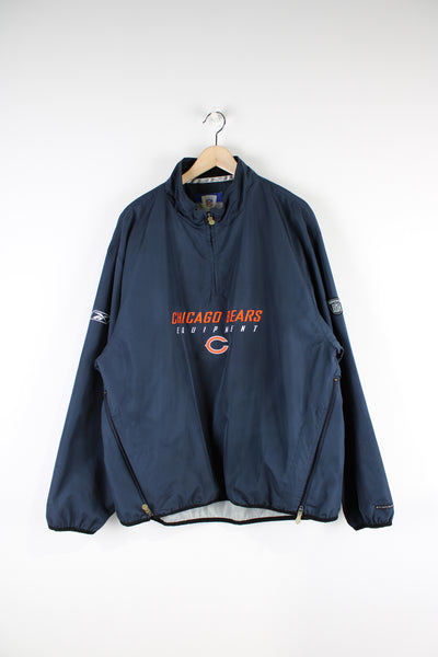 Vintage 00's Reebok Chicago Bears pull over /training top with quarter zip neckline and embroidered team logo on the across the chest. Also features zips down the sides of the torso. good condition - some faint marks on the back (see photos) Size in Label: L