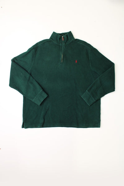 Polo Ralph Lauren forest green quarter zip jumper with leather zip pull detail and logo embroidered in red.