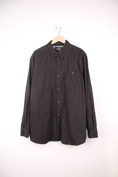 Harley Davidson Shirt in a black and brown striped colourway, button up, has double chest pockets, and the logo embroidered on the front and back. 