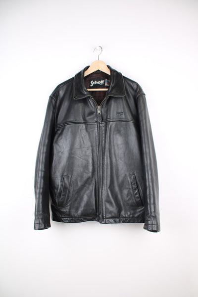 Vintage Schott N.Y.C Leather Jacket in a black colourway, zip up with side pockets and has the logo embroidered on the front. 