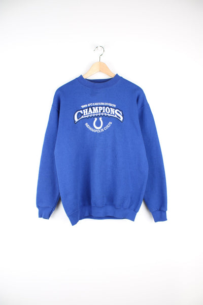 Vintage 1999 AFC Eastern Division Champions: Indianapolis Colts blue crewneck sweatshirt by Puma, features embroidered spell-out detail across the front