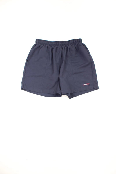 Reebok swim shorts with elasticated drawstring waist and embroidered logo.