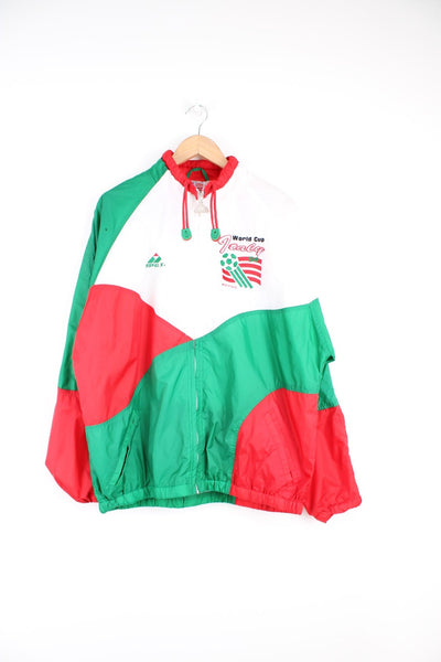 World Cup Italy 1994 Apex tracksuit top in white, green and red. Features embroidered logo on the chest and sleeve. 